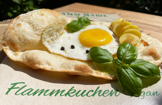 Mit Bratkartoffeln und Spiegelei